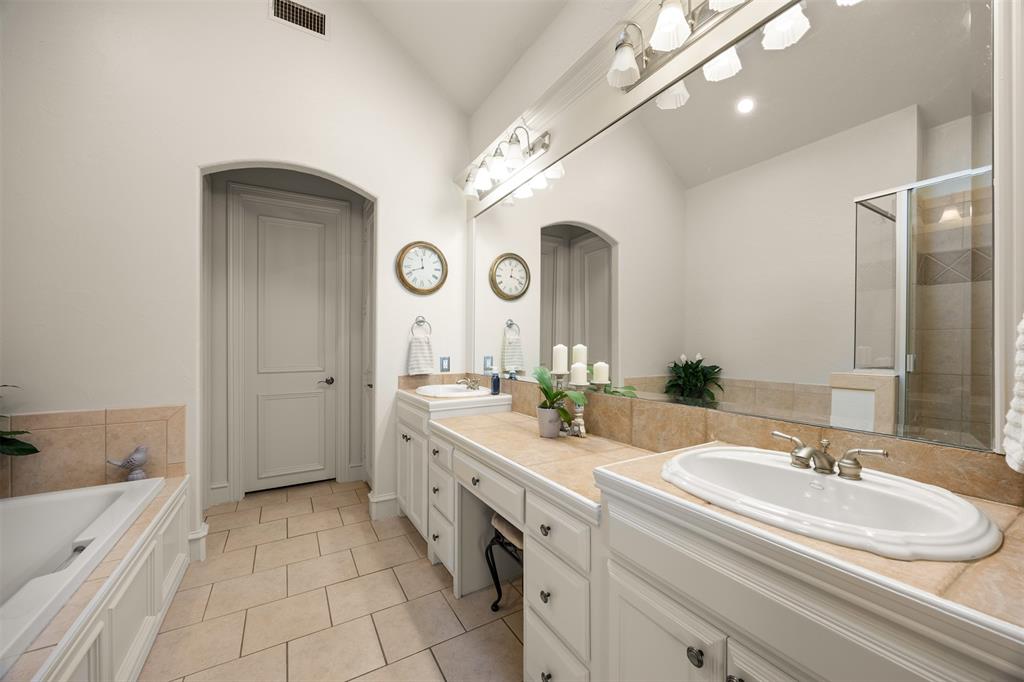 Spa-like primary bath has dual sinks and more.