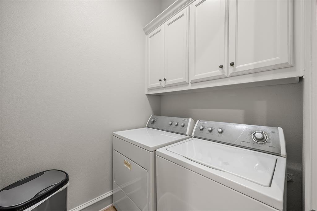 Laundry room is located off the kitchen.