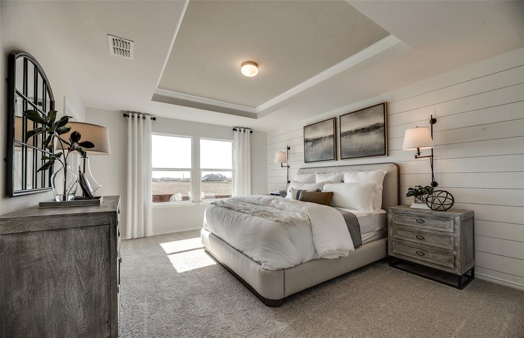 *Model Representation - Spacious owner's suite with private bath