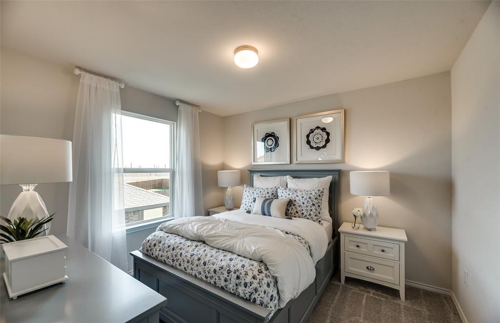 *Model Representation - Spacious secondary bedroom with large windows