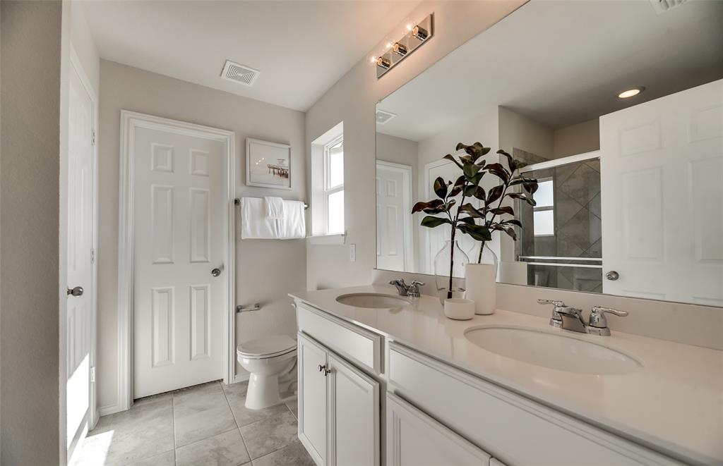 *Model Representation - Spacious owner's suite with private bath
