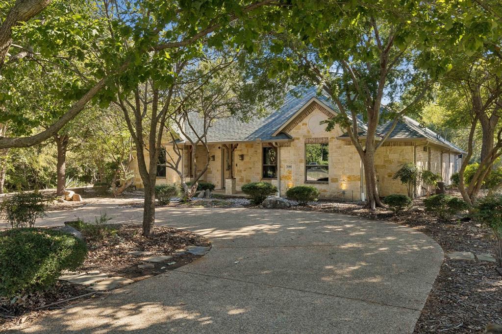 Front of home with circular driveway Front of home with circular driveway