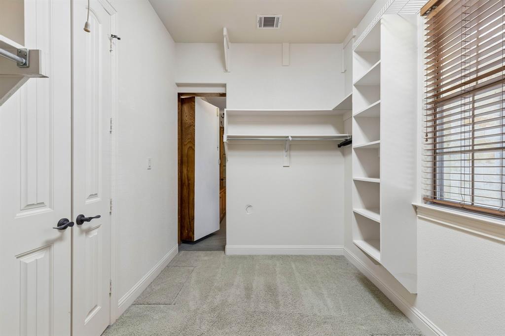 Secret door from office leads to primary closet