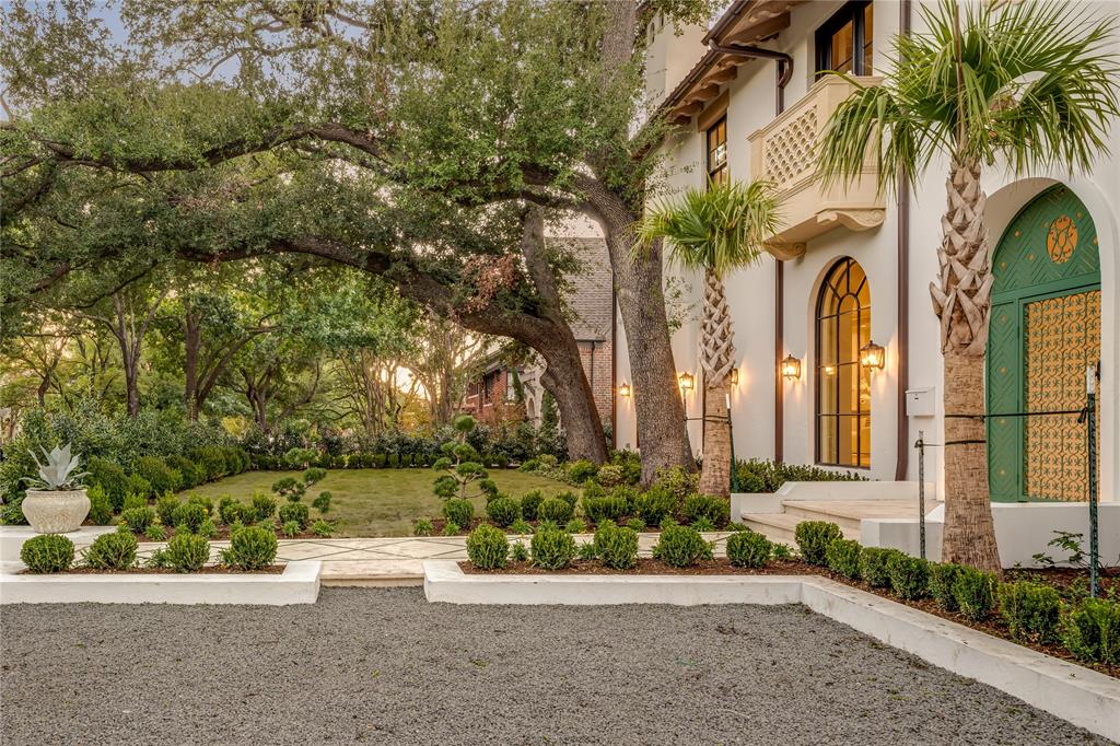 Oversized Hedged Front Yard & 2 designated parking spaces additional to 2 car garage