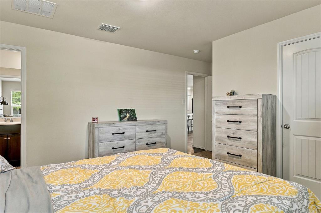 Interior space featuring neutral wall paint, smooth-finish ceiling, and a paneled interior door
