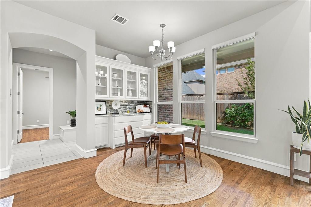 Breakfast nook with additional built-in cabinets