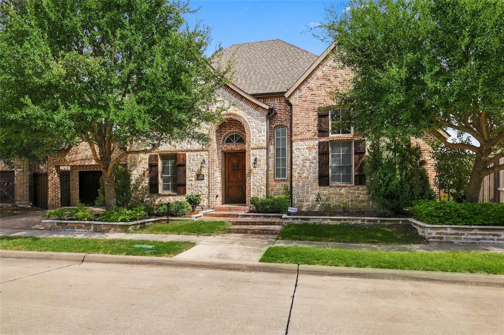 Brick and stone front elevation. 2-story home