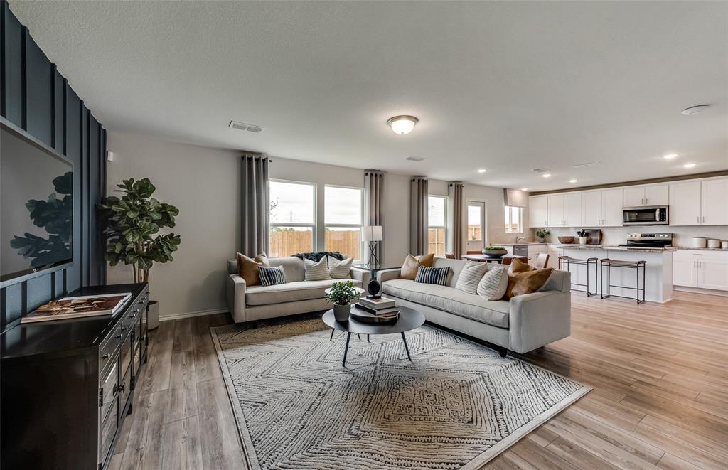 *Model Representation - Gathering room with view of main living areas