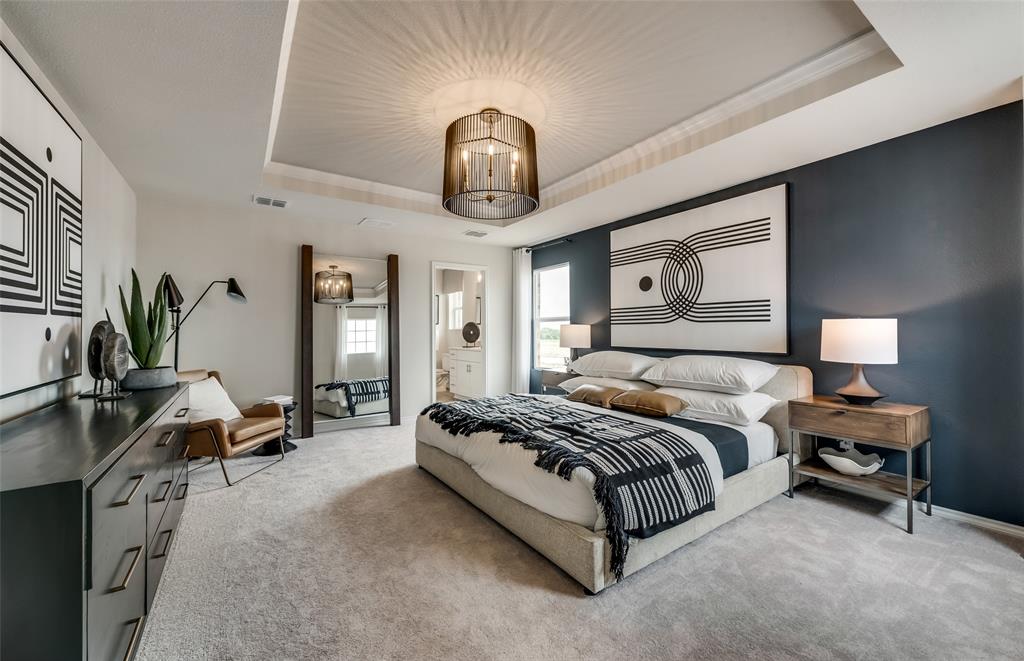 *Model Representation - Spacious owner's suite with private bath