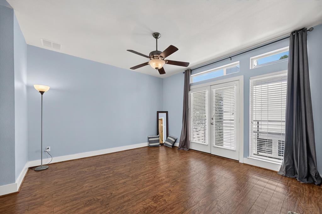 wonderful natural light with balcony in primary bedroom