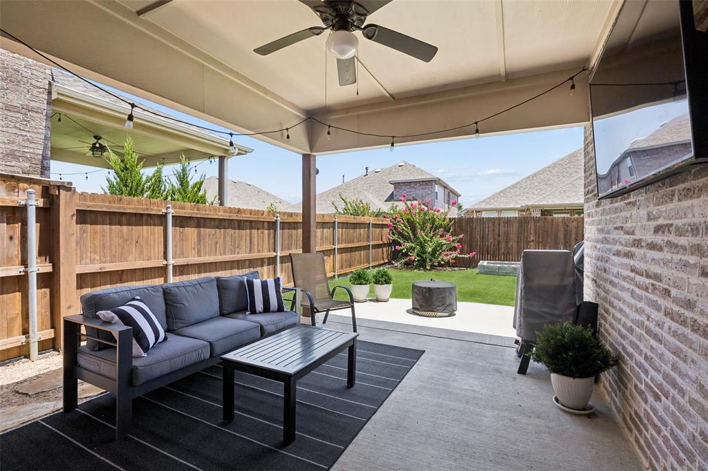 Covered patio featuring a ceiling fan is the perfect spot for a summer morning
