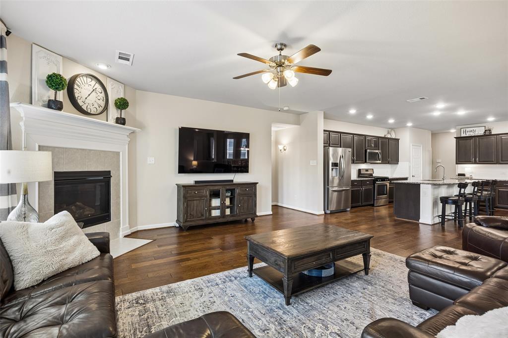 Here you can see the corner fireplace and large living space.