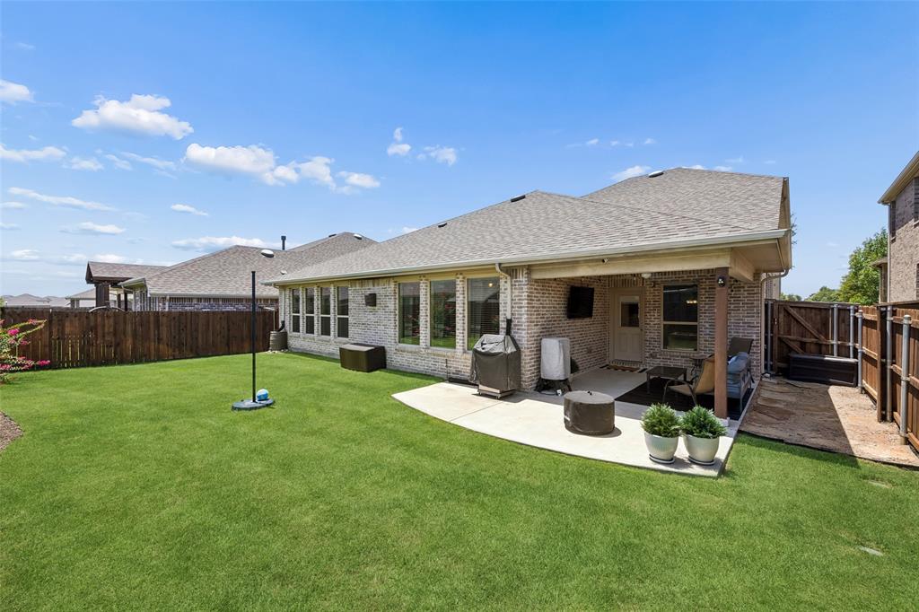 View of the back of the house and the extended patio