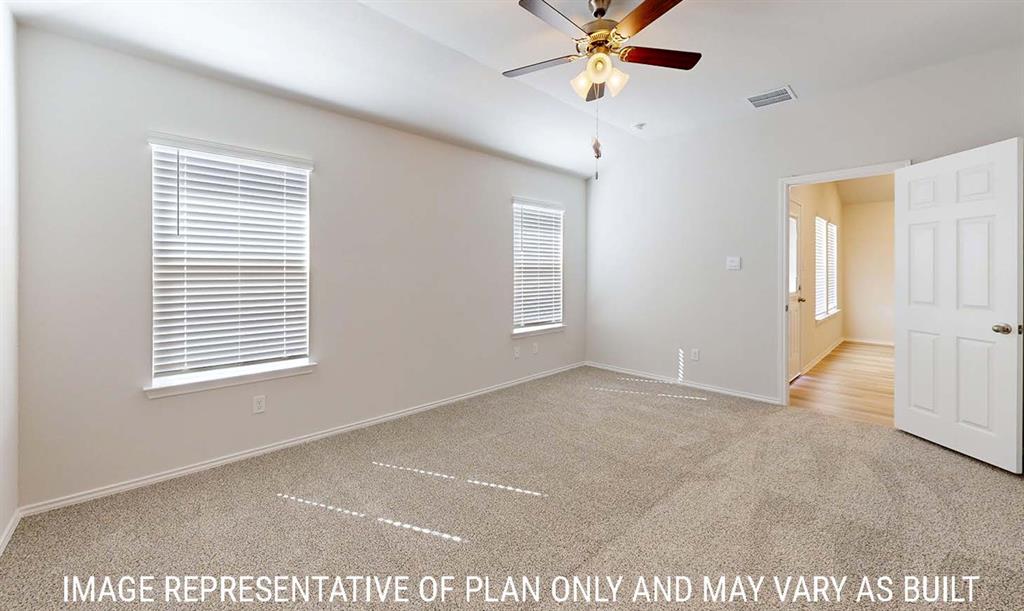 Room featuring high ceilings, neutral wall tones, carpeted flooring, two windows with horizontal blinds, and a ceiling fan