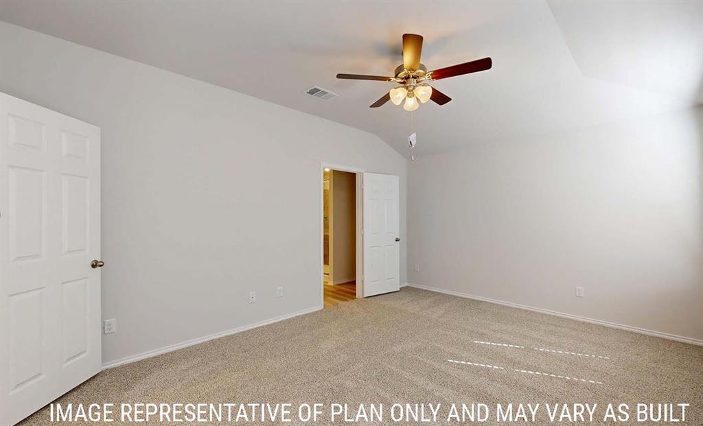 Vaulted ceilings featuring a central multi-light ceiling fan with dark-finish blades, neutral carpeting, and interior six-panel doors