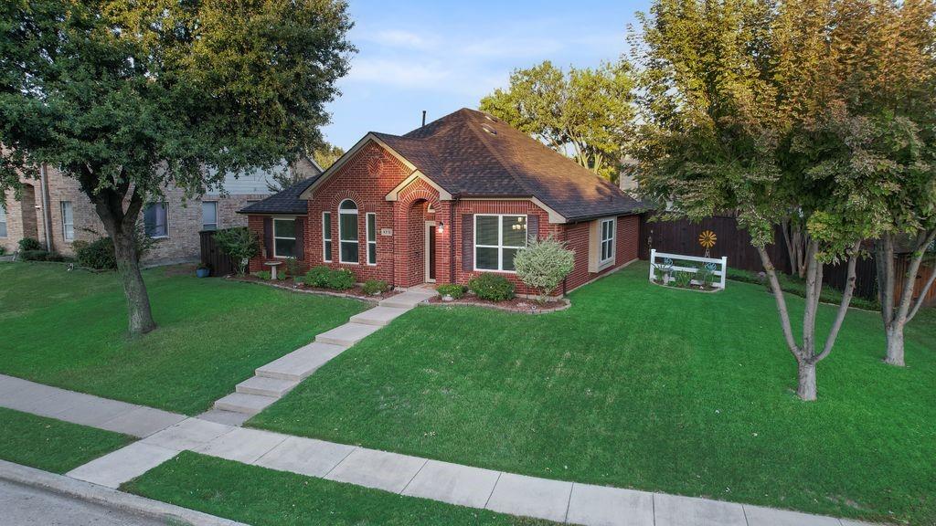 Huge front and side yard with mature trees and landscaping.