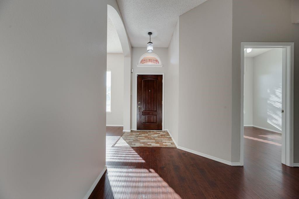 Engineered wood floors installed in 2020. Interior paint October 2026.