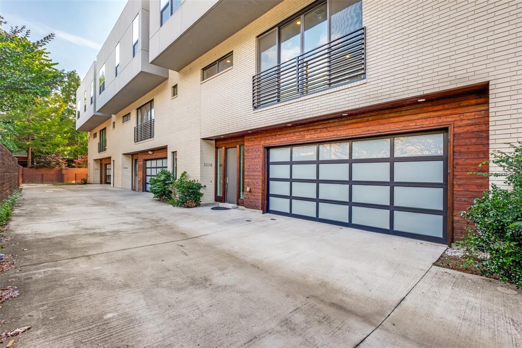 Front facing modern garage door with interior entry