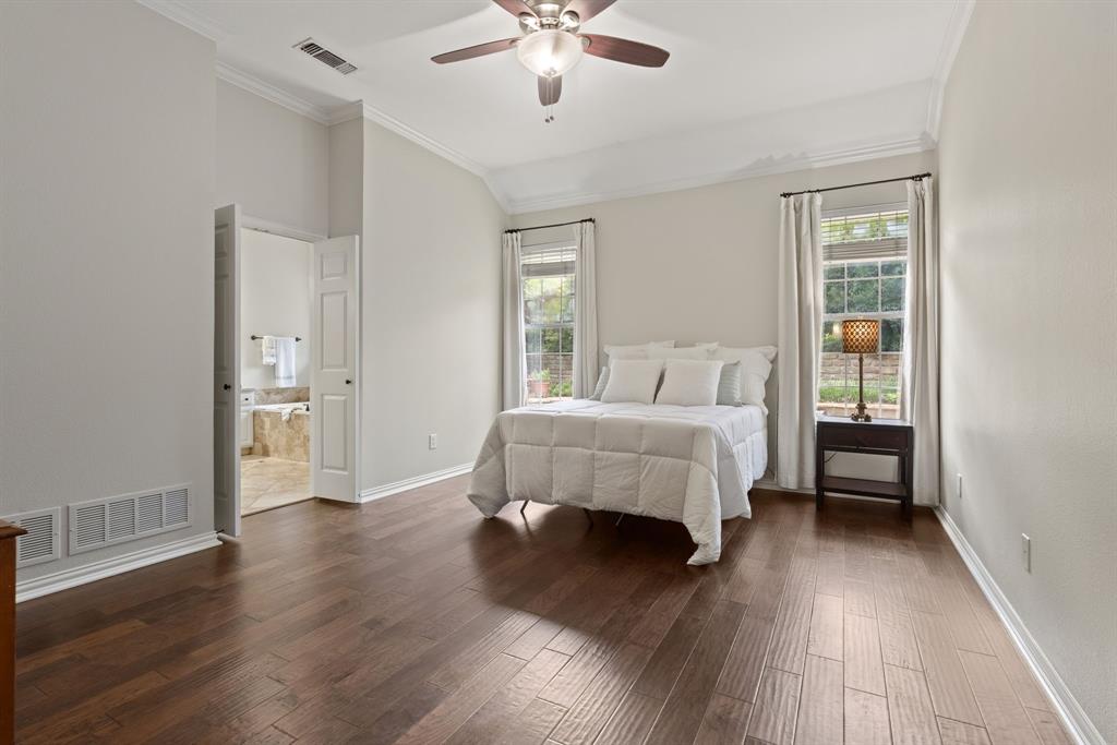 Vaulted ceilings, wood-finish flooring, and dual windows