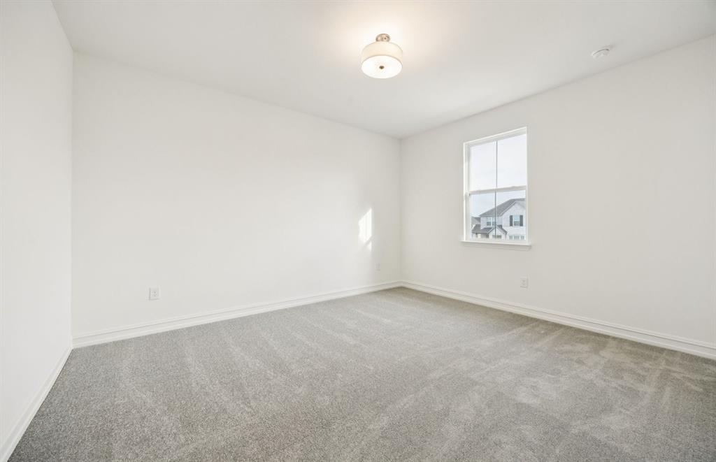 *Floorplan representation, not actual home - Spacious secondary bedroom with large windows