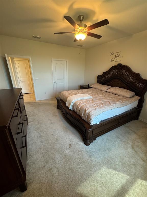 Spacious main bedroom area.