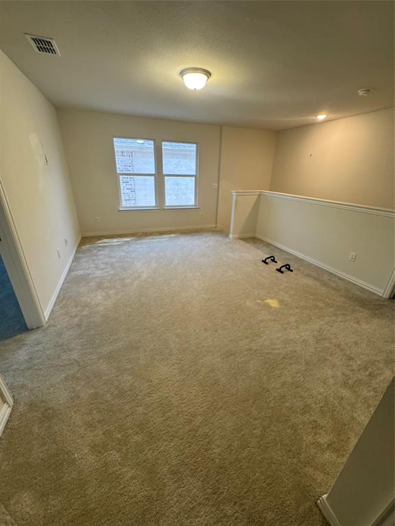 Second floor open den area.