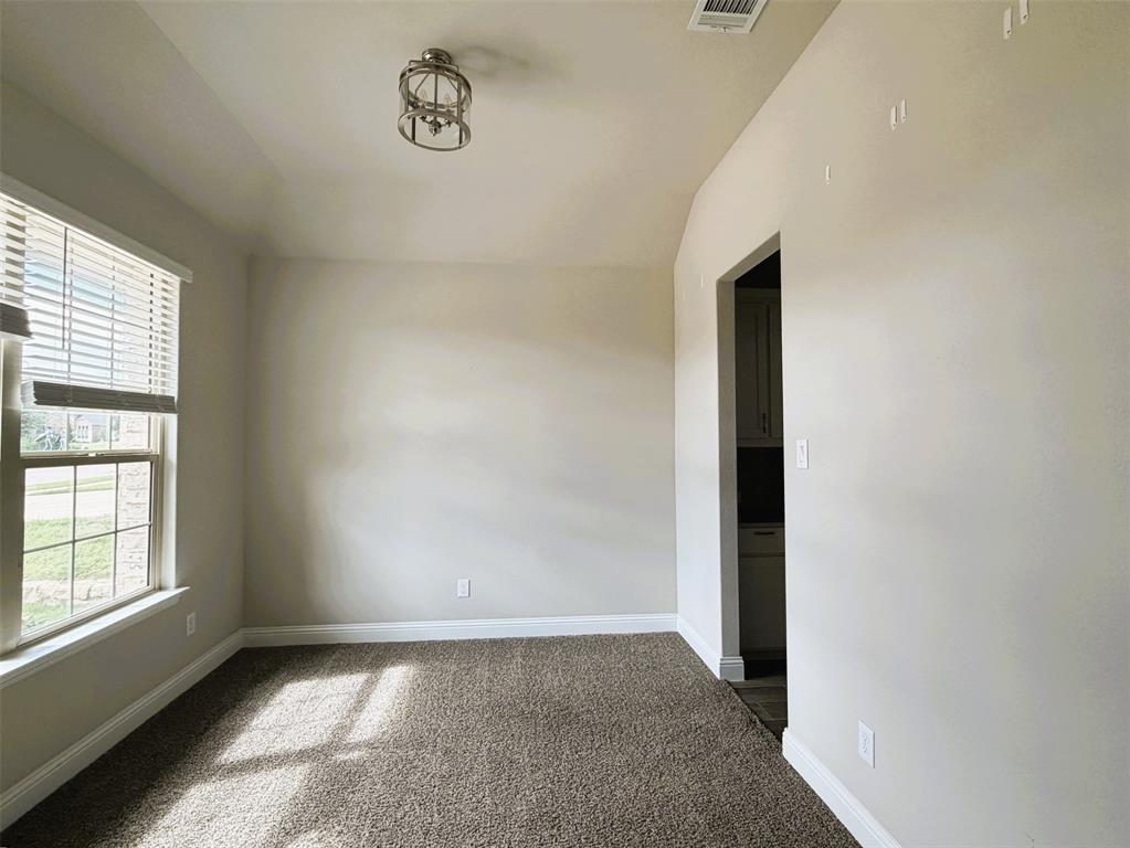 Dining room with butler's pantry at right for easy serving.