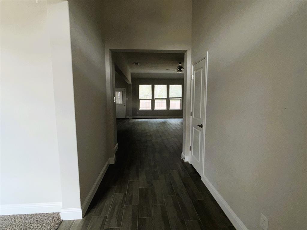 Reverse view leads into open living area - the hub of the home.