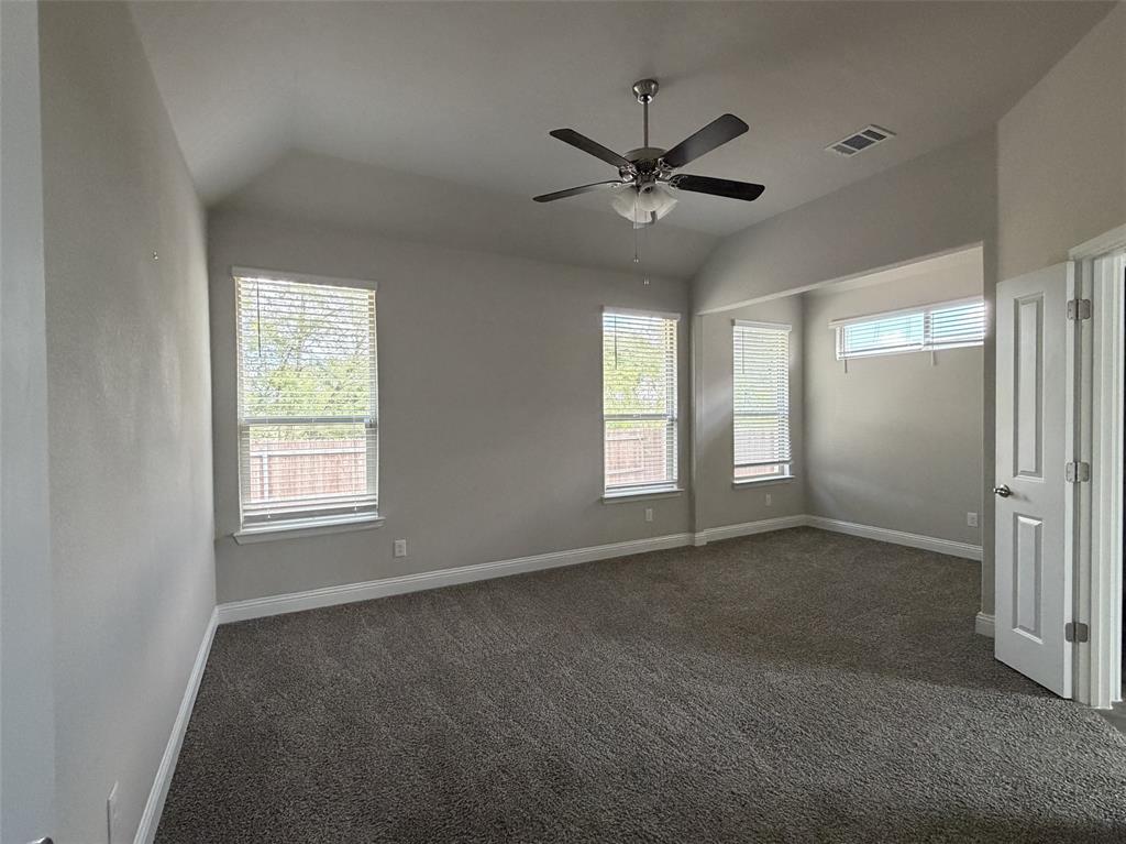Enjoy your own private oasis in the split primary bedroom.