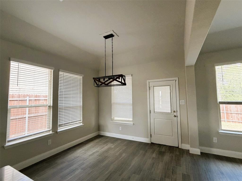Plenty of natural light flood the area.  Step outside to the covered patio.