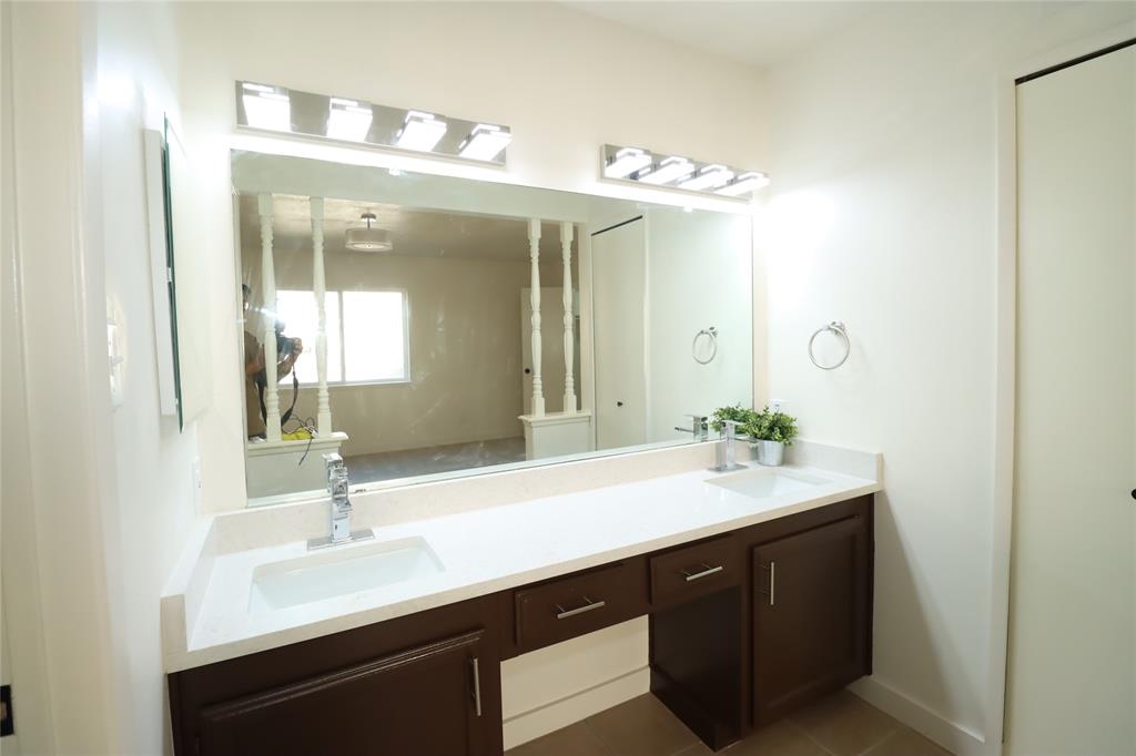 New dual undermount sinks, stone-finish countertops, and beautiful fixtures!