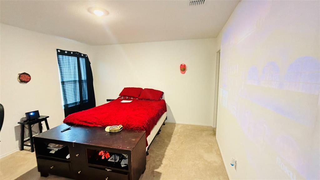 Neutral-toned wall finish, wall-to-wall carpeting, and recessed ceiling lighting