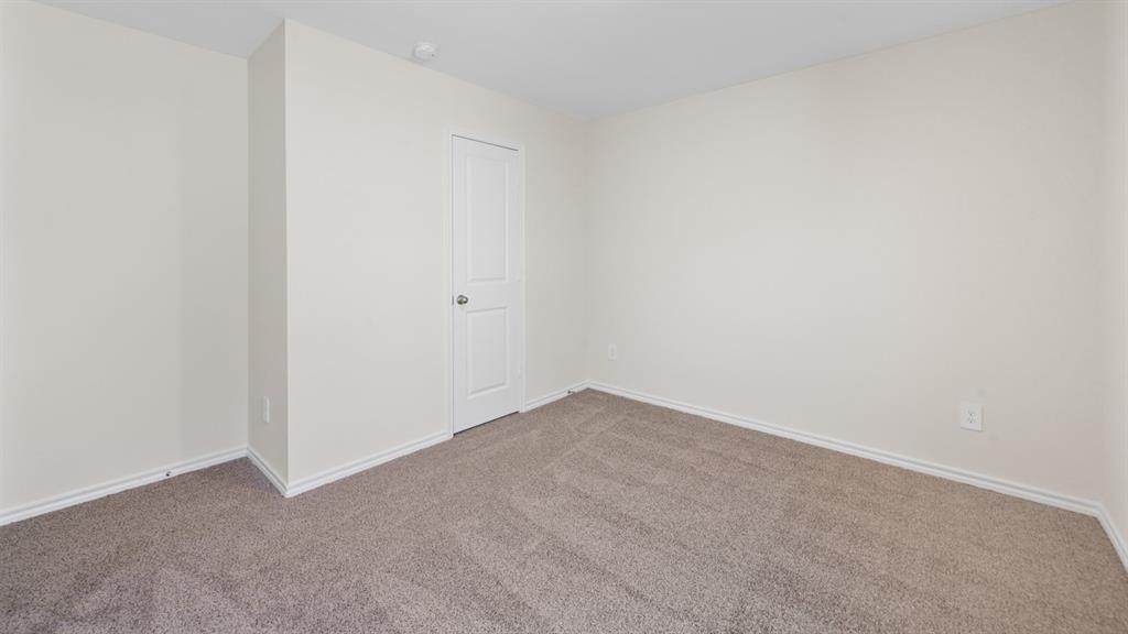 Neutral wall finishes with crisp white trim