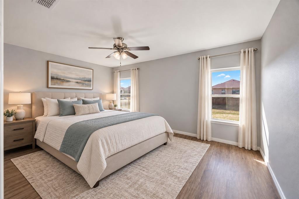 Primary Bedroom—Virtually Staged Primary Bedroom—Virtually Staged