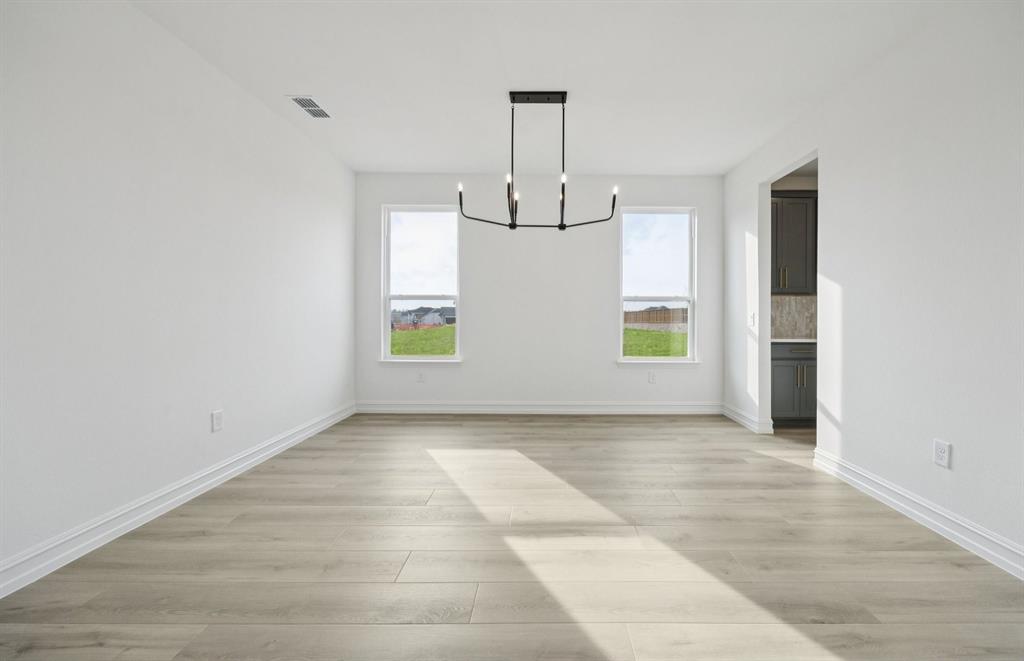 *Floorplan representation, not actual home - Formal dining room with large windows