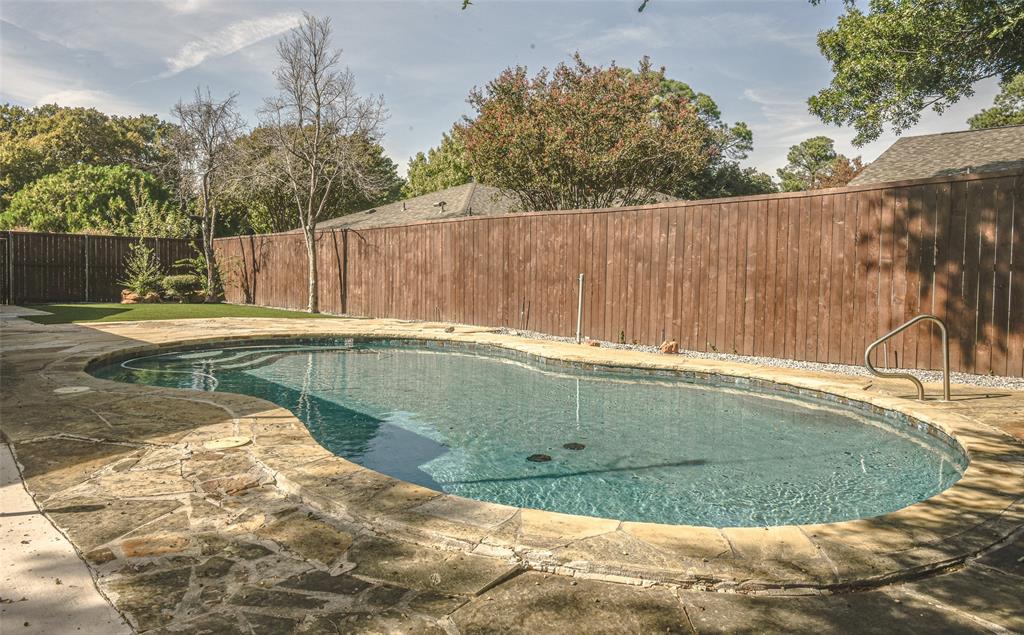 Imagine the fun-filled days ahead , enjoying your backyard with low maintenance and lovely inground pool with flagstone coping, full wood-plank fencing for privacy