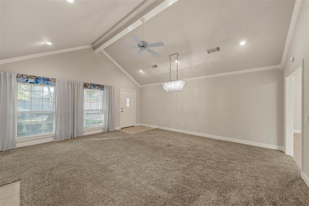 Vaulted ceilings featuring a chandelier, recessed lighting, and a ceiling fan, complemented by windows with natural light Vaulted ceilings featuring a chandelier, recessed lighting, and a ceiling fan, complemented by windows with natural light