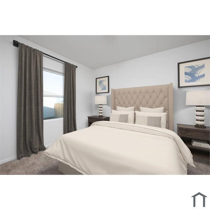 Neutral wall tones paired with wall-to-wall carpeting and a window featuring a black curtain rod