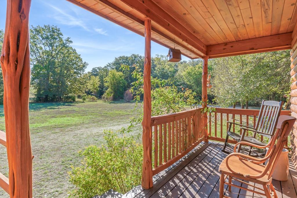 Covered porch has peaceful sounds and country views
