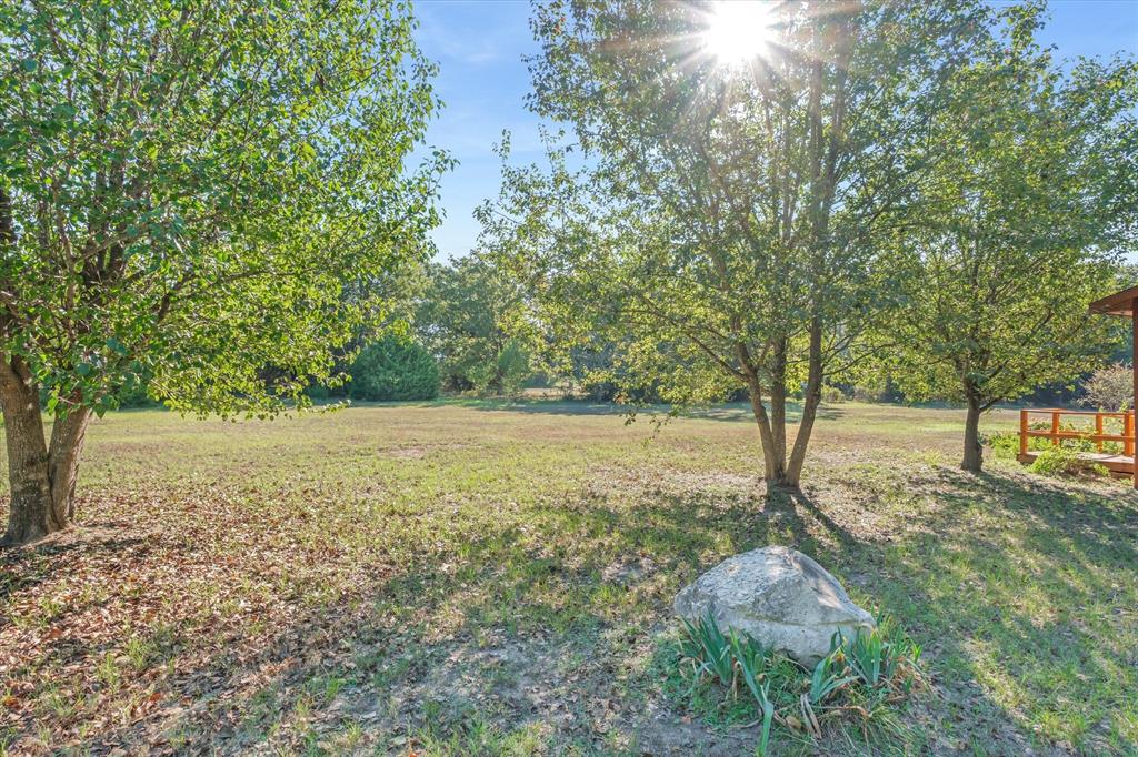 Open areas and woods describe this property