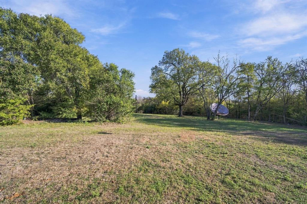 Backyard leading to rear of property