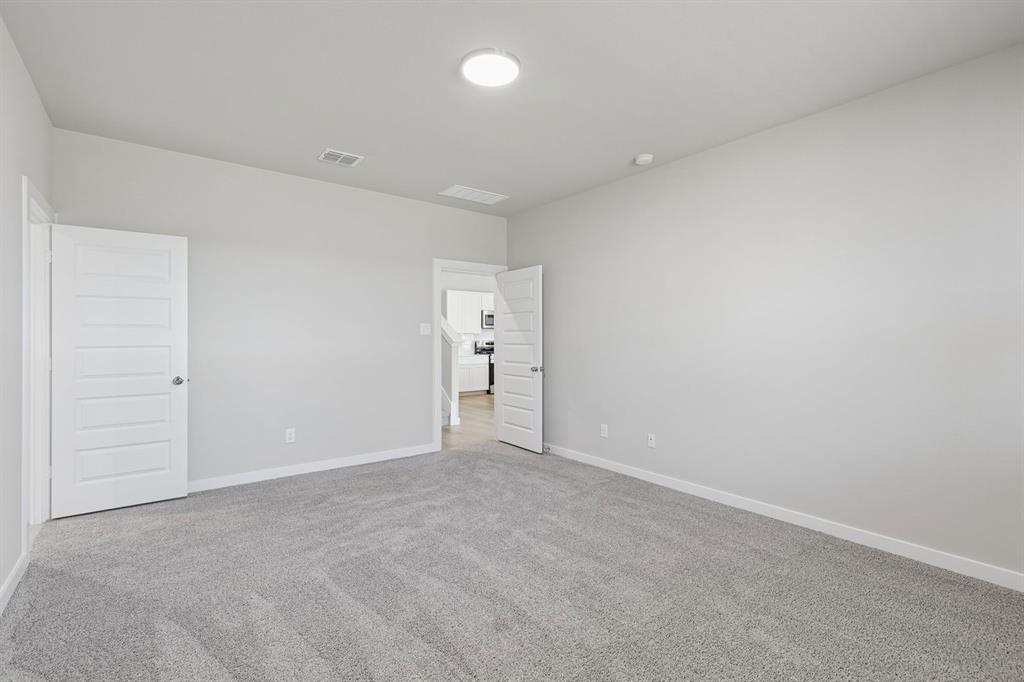 Primary Suite in the Holden home plan – REPRESENTATIVE PHOTO