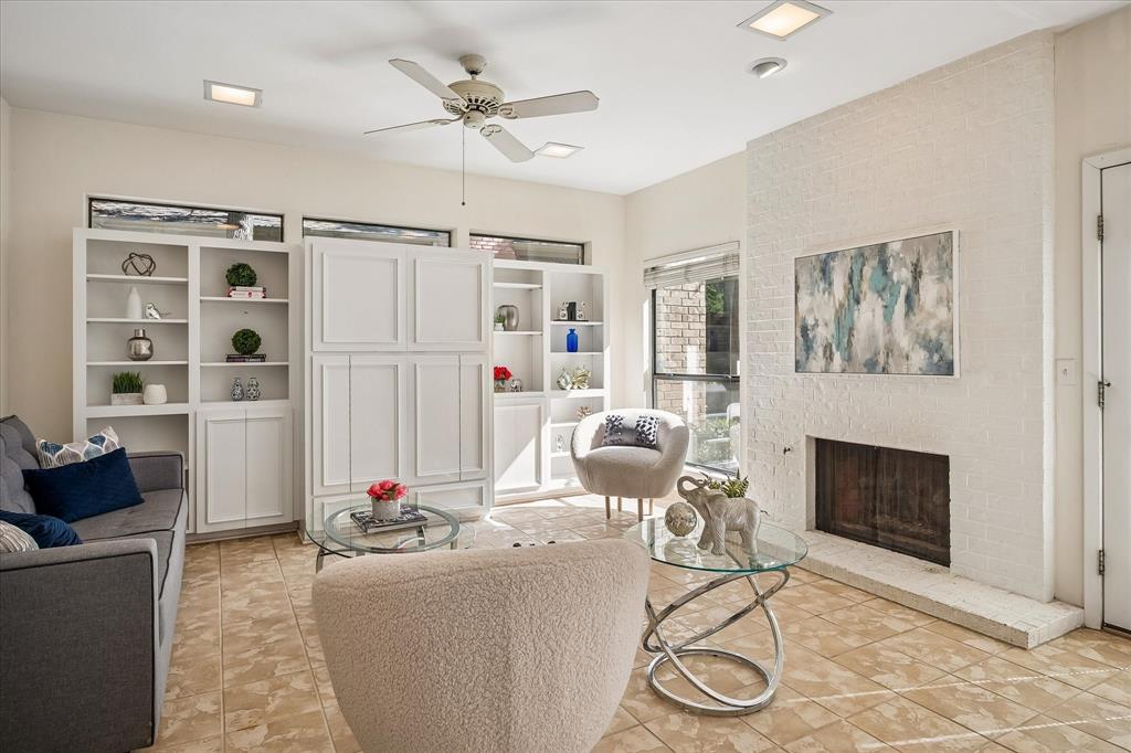 The family room is open to the kitchen providing an open concept to the home layout.  The built-ins provide a nice display and also has a gas log fireplace brining a feeling of warmth into the room.