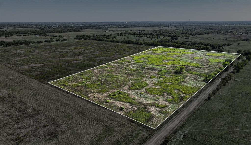 Expansive acreage featuring cleared topography, native vegetation, and frontage on a gravel road Expansive acreage featuring cleared topography, native vegetation, and frontage on a gravel road