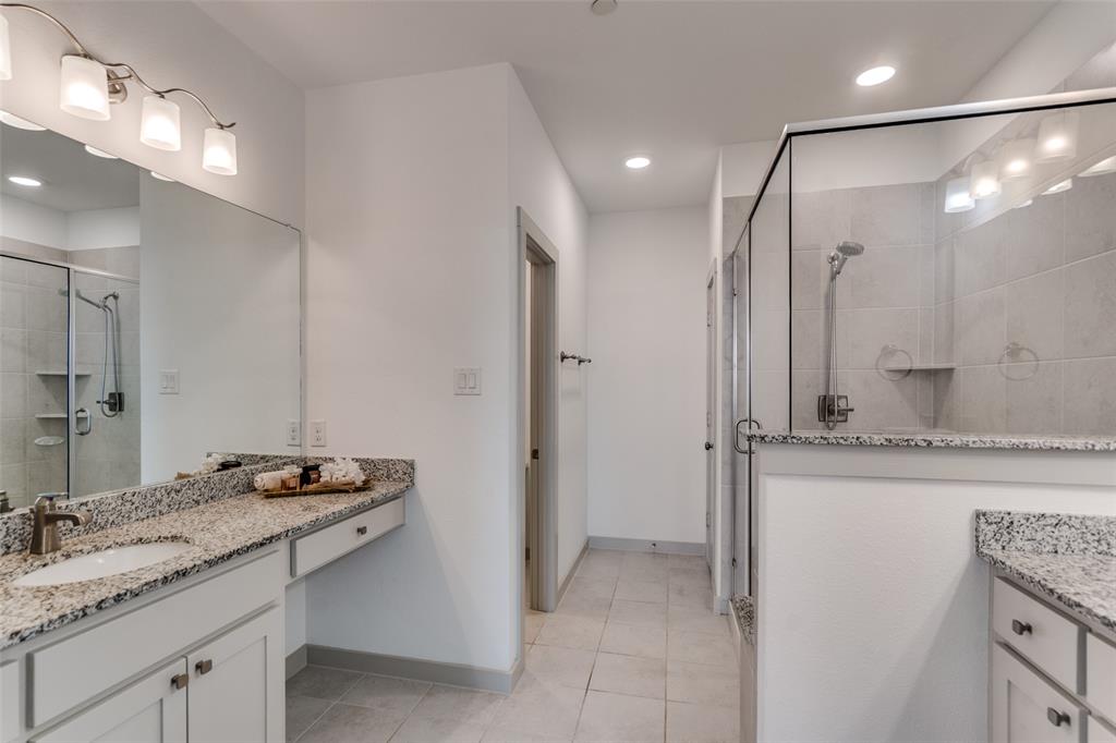 Full luxury ensuite primary bath, walk in closet, shower and, vanities and make up center