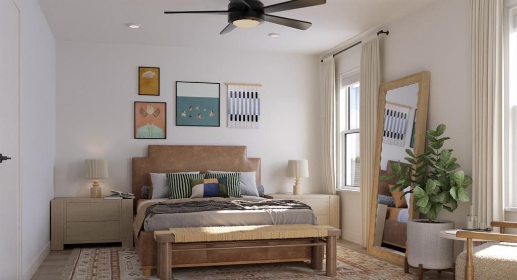 Bedroom with ceiling fan and baseboards