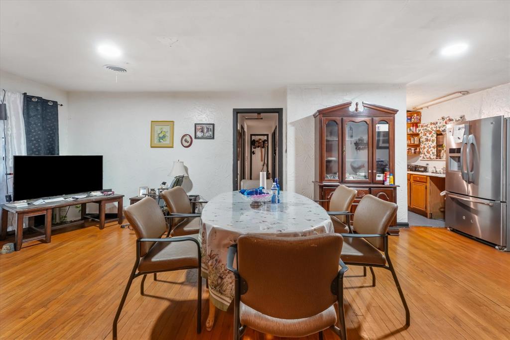 Hardwood-finish flooring, recessed lighting, and built-in glass-paneled display cabinetry Hardwood-finish flooring, recessed lighting, and built-in glass-paneled display cabinetry