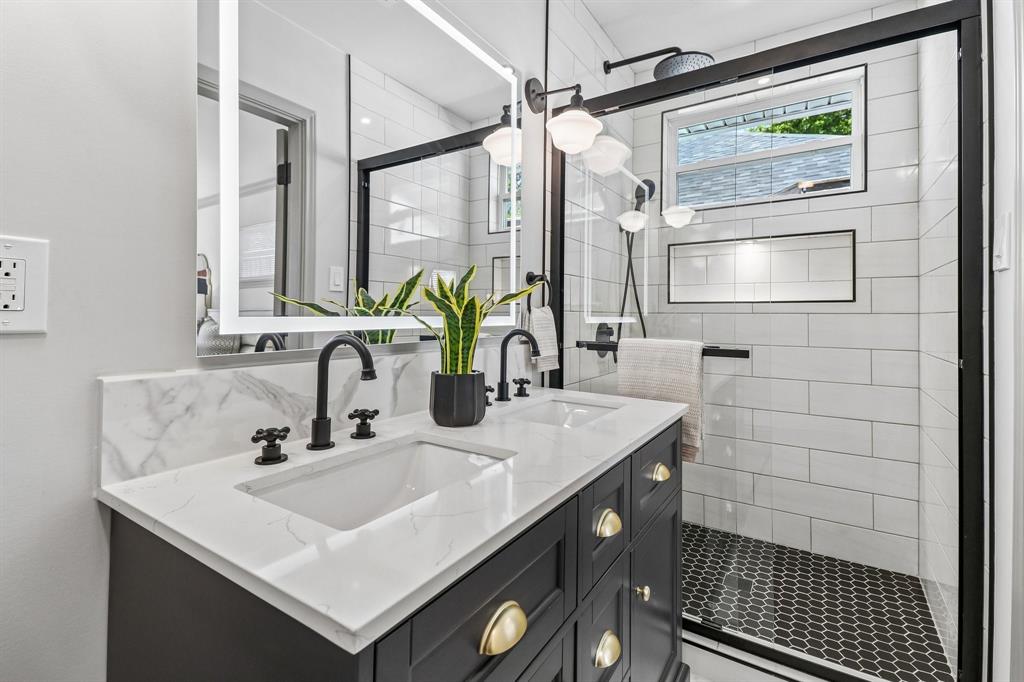 Dual vanity with white countertop and integrated sinks