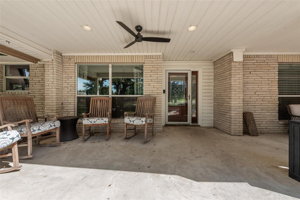 Covered patio featuring brick masonry walls, a beadboard ceiling, recessed lighting, and a ceiling fan Covered patio featuring brick masonry walls, a beadboard ceiling, recessed lighting, and a ceiling fan