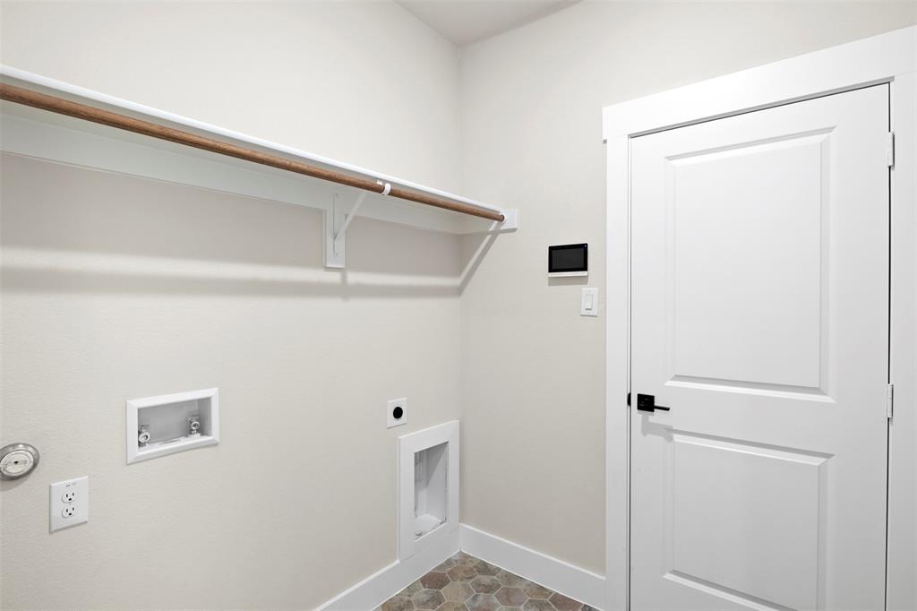 Laundry room with washer and dryer hook ups